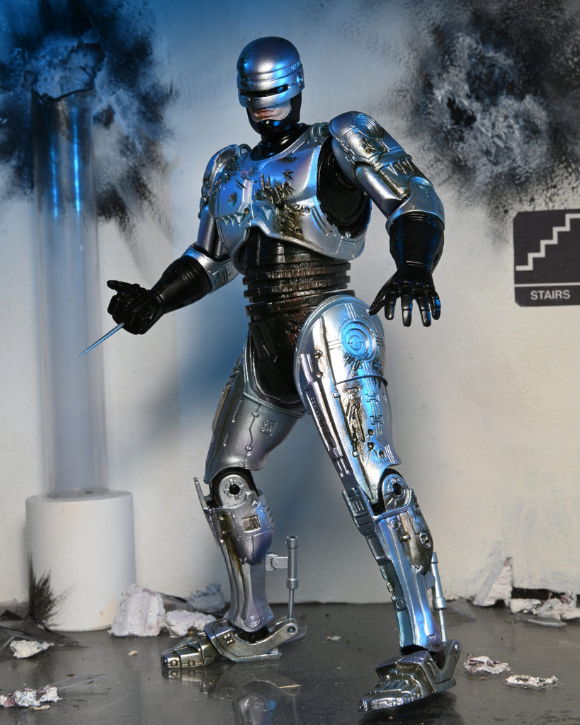 RoboCop Ultimate Battle-Damaged RoboCop with Chair 7-Inch Scale Action  Figure